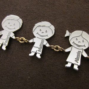 Bambini in argento 925°°° personalizzabili. Qui montati in un bracciale in oro 750°°°