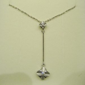 Pendente doppio in oro bianco con diamanti